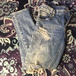 High waisted distressed light blue jeans
